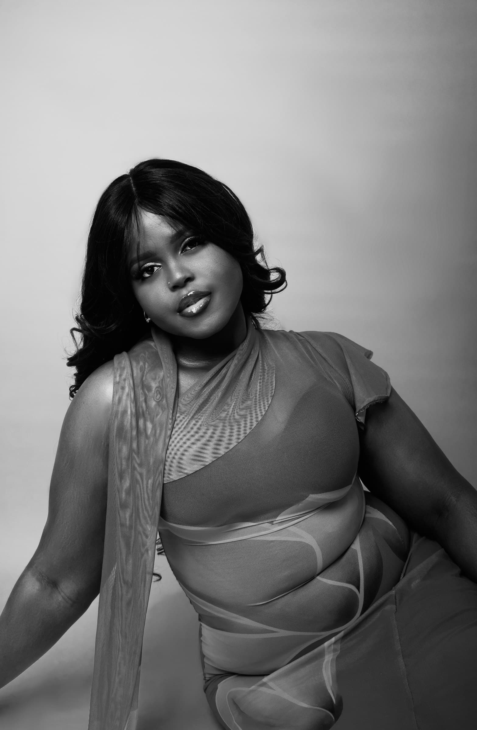 Taslemat Yusuf, black and white studio portrait